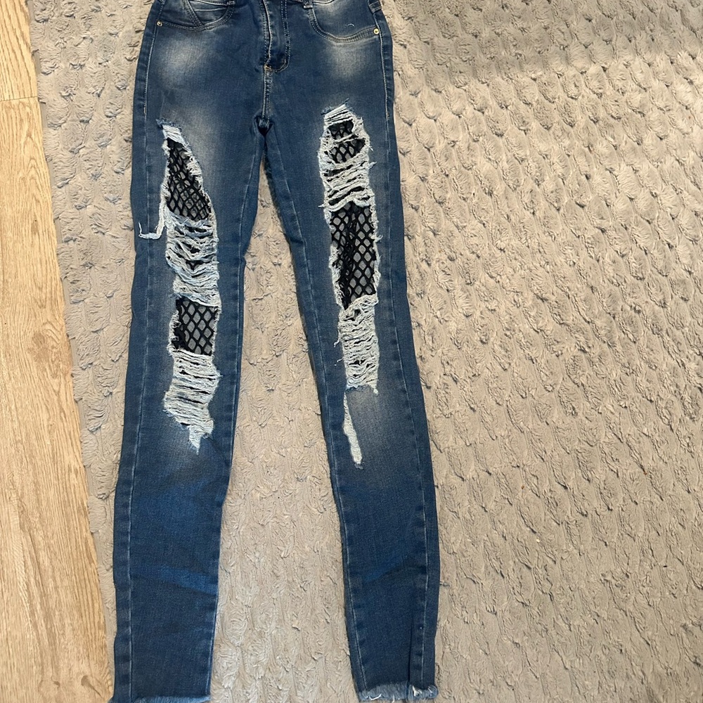 Distressed Blue Jeans with Fishnet Detail